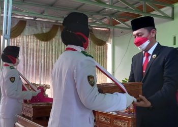 Pemkab Bolsel Gelar Upacara Pemindahan dan Persemayaman Bendera Merah Putih
