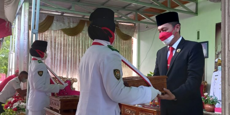 Pemkab Bolsel Gelar Upacara Pemindahan dan Persemayaman Bendera Merah Putih