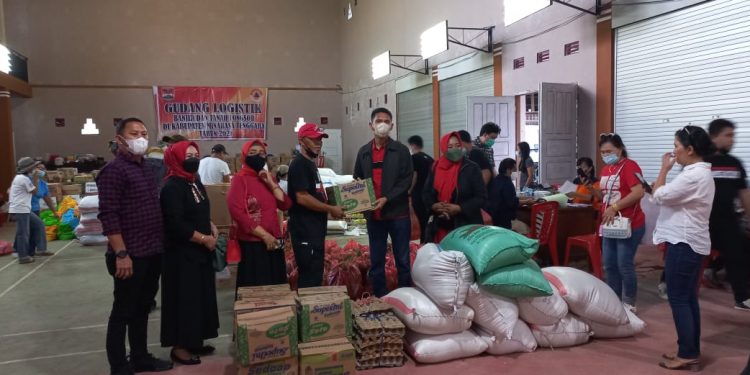 Peduli Bencana di Mitra, Fraksi Trisakti DPRD Bolsel Salurkan Bantuan