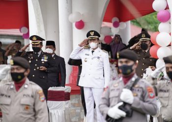 Bupati dan Wabup Bolsel Hadiri Upacara HUT Bhayangkara ke-76