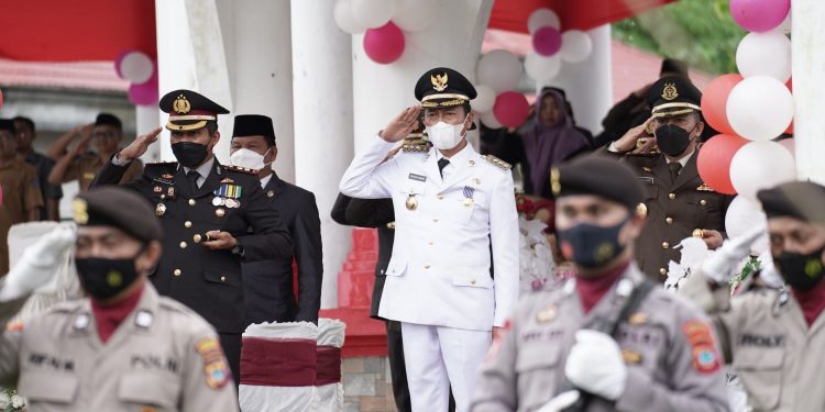 Bupati dan Wabup Bolsel Hadiri Upacara HUT Bhayangkara ke-76