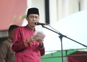 Meski Diguyur Hujan, Upacara Peringatan HUT ke-15 Kabupaten Bolsel Berjalan Khidmat
