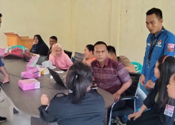 KPU Bolmut Gelar Monitoring dan Evaluasi Layanan DPTb di Dua Kecamatan