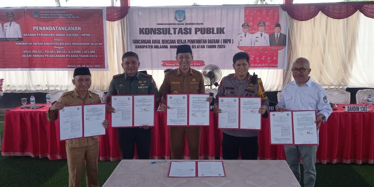 Bersama KPU, Kapolres dan Dandim 1303 Bolmong, Bupati Iskandar Kamaru Teken NPHD Pilkada 2024