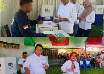 Didampingi Istri dan Kedua Putranya, Iskandar Kamaru Gunakan Hak Pilih di TPS 001 Momalia