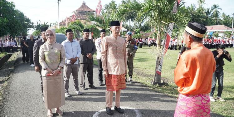 Momentum HUT Ke-22 Kecamatan Posigadan, Bupati Ajak Masyarakat Membangun dan Majukan Daerah