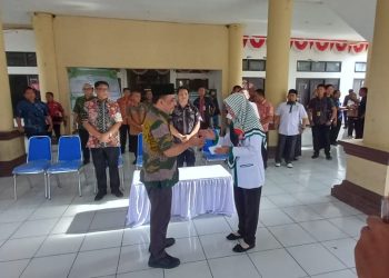 ASN dan PPPK Pemkab Bolmong Salurkan Zakat Fitra Lewat BAZNAS