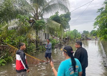 Sekda Bolmong Turun Langsung Pantau Kondisi Banjir di Kecamatan Poigar